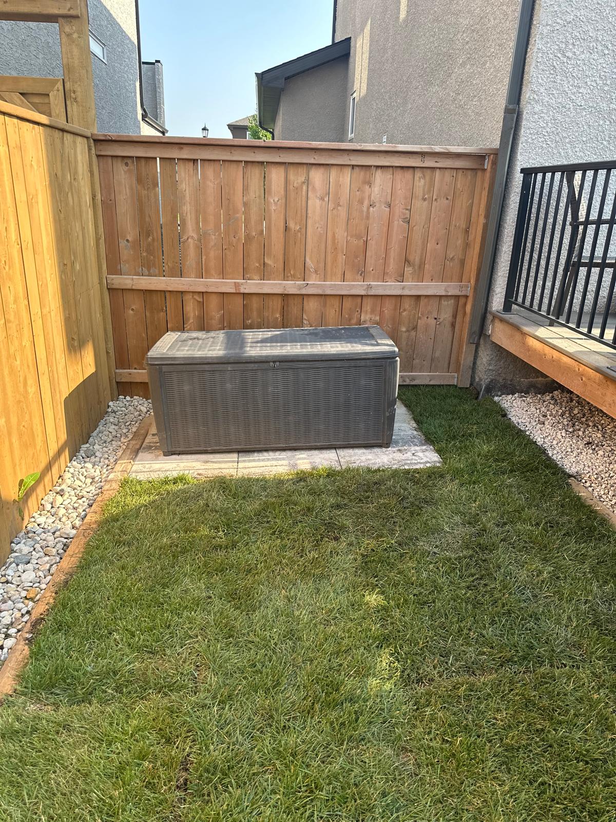 A freshly mowed lawn in a backyard